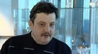 Андрій Шахов: «Завісити логотип КАС шарфиком «Маріуполя» - це, напевно, Журавльов від великого розуму зробив. Він би ще стікерами будівлю КАС обклеїв»